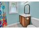 Bright bathroom with colorful shower curtain and modern sink at 715 9Th Ave. S, Surfside Beach, SC 29575