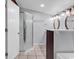 Bathroom with shower stall and updated dual sink vanity at 715 9Th Ave. S, Surfside Beach, SC 29575