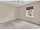 Bedroom with neutral carpet, and window with exterior view at 715 9Th Ave. S, Surfside Beach, SC 29575