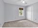 Comfortable bedroom with a ceiling fan and view from the window at 715 9Th Ave. S, Surfside Beach, SC 29575