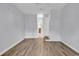 Bright bedroom with wood-look flooring and fresh paint at 715 9Th Ave. S, Surfside Beach, SC 29575