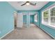 Bedroom with neutral carpet, mirrored closet and window at 715 9Th Ave. S, Surfside Beach, SC 29575