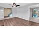 Cozy living room with wood floors, access to the backyard, and stairs to the second floor at 715 9Th Ave. S, Surfside Beach, SC 29575