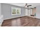 Spacious room featuring durable wood-look floors, a window for natural light, and neutral walls at 715 9Th Ave. S, Surfside Beach, SC 29575