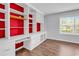 Office space featuring custom built-ins, a window, and wood-look floors for a modern feel at 715 9Th Ave. S, Surfside Beach, SC 29575