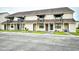 Two-story condo building featuring balconies, vinyl siding, and well-maintained green spaces at 755 Burcale Rd. # D6, Myrtle Beach, SC 29579