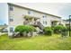 Apartment building exterior with outdoor stairways and landscaping at 755 Burcale Rd. # D6, Myrtle Beach, SC 29579