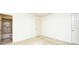 Carpeted bedroom featuring neutral walls and a door to a bathroom at 816 Kittiwake Ln., Murrells Inlet, SC 29576