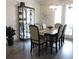 Bright dining area with a dining table, chairs, and patio access to outdoor space at 932 Mildred Ct., Murrells Inlet, SC 29576