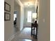 Inviting entryway with light-colored walls, a decorative rug, and crown molding at 932 Mildred Ct., Murrells Inlet, SC 29576