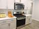 Well-equipped kitchen featuring stainless steel appliances, stylish countertops, and ample cabinet space at 932 Mildred Ct., Murrells Inlet, SC 29576