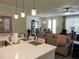 Bright and airy kitchen overlooking the dining and living areas, ideal for entertaining and Gathering gatherings at 932 Mildred Ct., Murrells Inlet, SC 29576