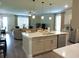 Open-concept kitchen with a center island flowing into the living room, perfect for entertaining at 932 Mildred Ct., Murrells Inlet, SC 29576