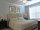 Serene main bedroom with neutral tones, ample natural light, and a ceiling fan at 932 Mildred Ct., Murrells Inlet, SC 29576