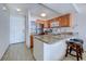 Kitchen featuring granite countertops, stainless appliances, and breakfast bar at 9400 Shore Dr. # 523, Myrtle Beach, SC 29572