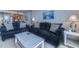 Cozy living room with plush couches, modern decor, and a glimpse of the adjoining kitchen at 9400 Shore Dr. # 523, Myrtle Beach, SC 29572