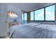 Bright bedroom with a large window offering ocean views at 9400 Shore Dr. # 523, Myrtle Beach, SC 29572