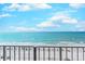 Scenic ocean view with beach umbrellas, chairs, and clear blue skies at 9400 Shore Dr. # 523, Myrtle Beach, SC 29572