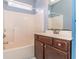 Bathroom featuring a tub-shower combination with vanity, providing a functional space at 9569 Indigo Club Dr., Murrells Inlet, SC 29576