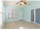 Inviting living room with natural light and a ceiling fan, offering a cozy space at 9569 Indigo Club Dr., Murrells Inlet, SC 29576