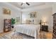 Spacious bedroom with a tray ceiling, a plush bed, and a serene, airy atmosphere at 967 Henry James Dr., Myrtle Beach, SC 29579