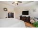 Comfortable bedroom featuring hardwood floors, modern furniture, and a ceiling fan at 967 Henry James Dr., Myrtle Beach, SC 29579