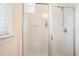 Modern glass-enclosed shower with chrome fixtures and built-in shelving at 967 Henry James Dr., Myrtle Beach, SC 29579