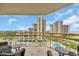 Lovely balcony view featuring outdoor furniture and the community pool at 101 Ocean Creek Dr. # Dd7, Myrtle Beach, SC 29572