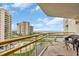 Expansive balcony view showcasing the ocean, pools, and scenic coastal landscape providing a tranquil setting at 101 Ocean Creek Dr. # Dd7, Myrtle Beach, SC 29572