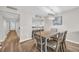 Cozy dining area featuring table with four chairs, stylish decor, and an opening to the kitchen at 101 Ocean Creek Dr. # Dd7, Myrtle Beach, SC 29572