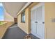 Condo exterior hallway featuring a white door at 101 Ocean Creek Dr. # Dd7, Myrtle Beach, SC 29572