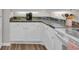 Bright kitchen area featuring modern appliances, stylish countertops, and clean white cabinets at 101 Ocean Creek Dr. # Dd7, Myrtle Beach, SC 29572