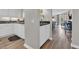 Open-concept kitchen with white cabinetry, modern appliances, and a seamless view into the living area at 101 Ocean Creek Dr. # Dd7, Myrtle Beach, SC 29572