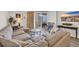Cozy living room featuring comfortable sofa, stylish decor, and a balcony with scenic views at 101 Ocean Creek Dr. # Dd7, Myrtle Beach, SC 29572