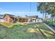 Spacious backyard with a covered patio area and a detached garage, ideal for outdoor enjoyment at 1014 Thomas Ave., North Myrtle Beach, SC 29582