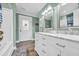 Bathroom featuring a double sink vanity, and a bathtub with shower at 1014 Thomas Ave., North Myrtle Beach, SC 29582