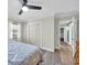 Cozy bedroom with soft colors, a ceiling fan, and a view into the hallway at 1014 Thomas Ave., North Myrtle Beach, SC 29582