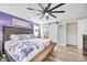 Spacious bedroom with bed, ceiling fan, and connecting door to bathroom at 1014 Thomas Ave., North Myrtle Beach, SC 29582