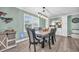 Charming dining room with a wooden table set, stylish lighting fixture, and nice decor at 1014 Thomas Ave., North Myrtle Beach, SC 29582
