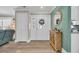 Welcoming foyer with a decorative mirror, stylish furniture, and a double door entry at 1014 Thomas Ave., North Myrtle Beach, SC 29582