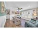 Bright living room features luxury vinyl floors, white trim and comfortable furnishings at 1014 Thomas Ave., North Myrtle Beach, SC 29582