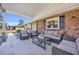 Covered outdoor patio with comfortable seating, perfect for relaxing and enjoying the outdoor space at 1014 Thomas Ave., North Myrtle Beach, SC 29582
