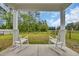Covered back porch overlooking yard at 112 Carolina Lakes Blvd., Myrtle Beach, SC 29588