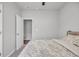 Bright bedroom featuring floral bedding and neutral walls at 112 Carolina Lakes Blvd., Myrtle Beach, SC 29588