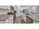 Spacious kitchen featuring stainless steel appliances, granite countertops, and ample cabinet space for storage at 112 Carolina Lakes Blvd., Myrtle Beach, SC 29588
