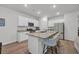 Contemporary kitchen with stainless appliances, a central island, and barstool seating at 112 Carolina Lakes Blvd., Myrtle Beach, SC 29588