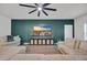 Cozy living room with a modern ceiling fan, large TV, and comfortable seating at 112 Carolina Lakes Blvd., Myrtle Beach, SC 29588