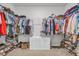 Well-organized walk-in closet with ample storage for shoes, clothes, and accessories at 112 Carolina Lakes Blvd., Myrtle Beach, SC 29588
