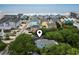 Charming coastal neighborhood with colorful homes near the beach, offering a serene seaside lifestyle at 113 Woodland Dr., Murrells Inlet, SC 29576
