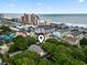Stunning aerial shot of the property near the beach and hotels at 113 Woodland Dr., Murrells Inlet, SC 29576
